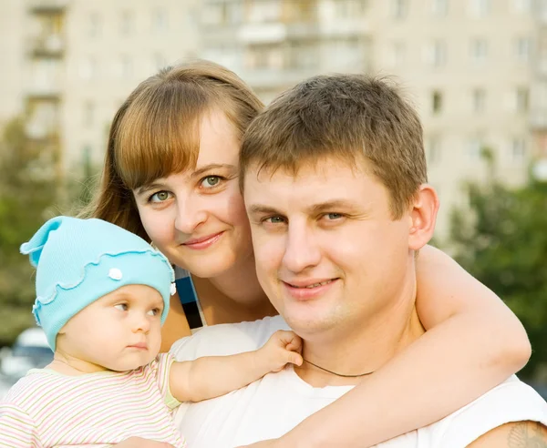 Happy family of three — Stock Photo, Image