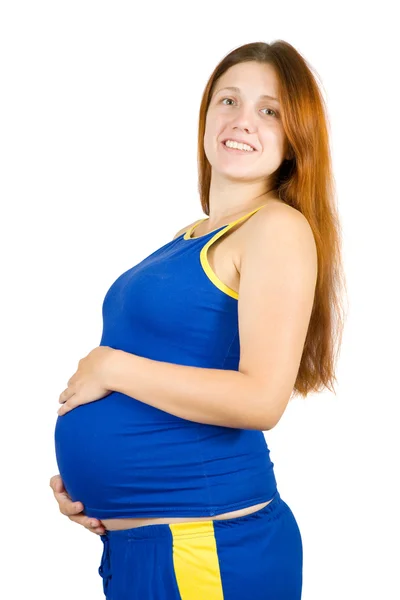 Mujer embarazada sobre blanco — Foto de Stock