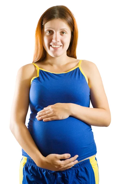 おなかを抱えている妊婦さん — ストック写真