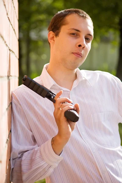 Homem com arma — Fotografia de Stock