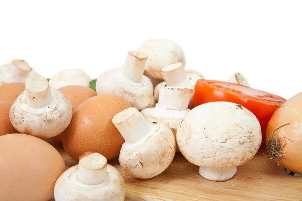 Champignon mushroom with eggs — Stock Photo, Image
