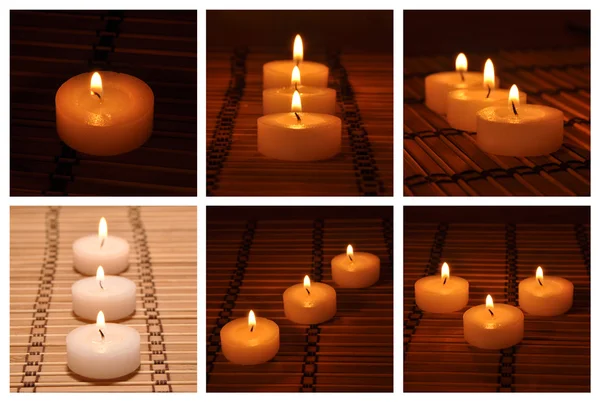 Различные свечи на бамбуковом ковре — стоковое фото