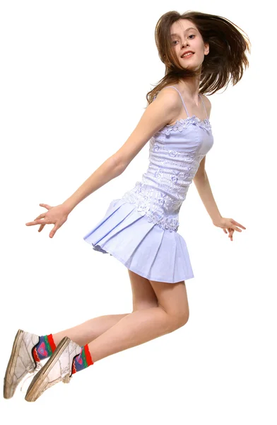 Menina salta para a frente — Fotografia de Stock