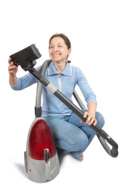 Smiling Woman vacuuming clipart