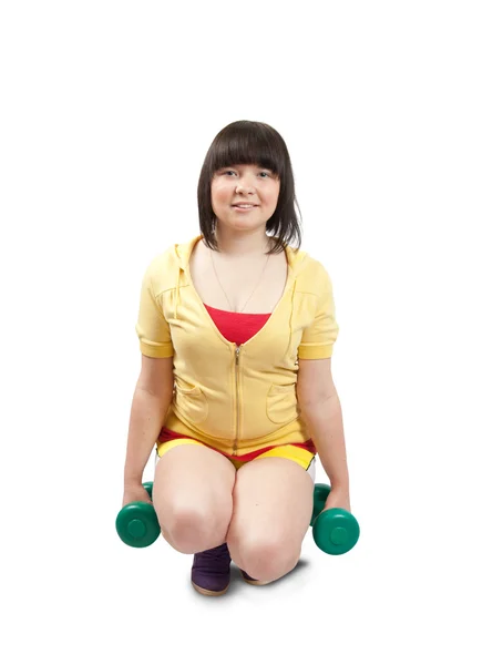 Lány gyakorlás súlyokkal. — Stock Fotó