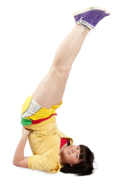 Sportig flicka i gul sportkläder. — Stockfoto