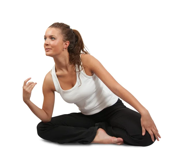Жінка робить йогу над білим — стокове фото