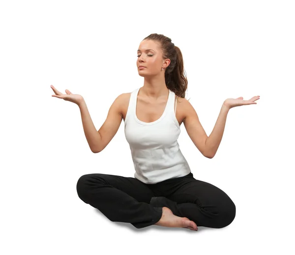 Ung kvinna gör yoga över vita — Stockfoto