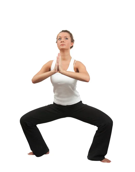Passen brunette praktizerende yoga — Stockfoto