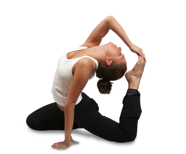 Giovane donna che pratica Yoga — Foto Stock