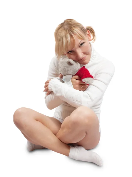 Menina loira incumbente com brinquedo fofinho — Fotografia de Stock