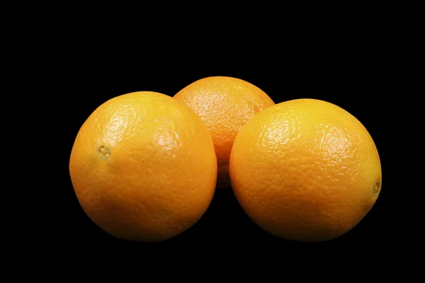 Апельсини чорною фарбою Стокове Зображення