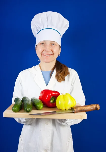 Female cook with vegetables — Stock Photo, Image
