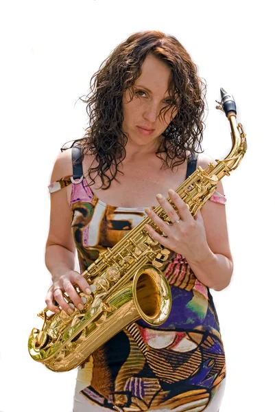 Девушка и саксофон — стоковое фото