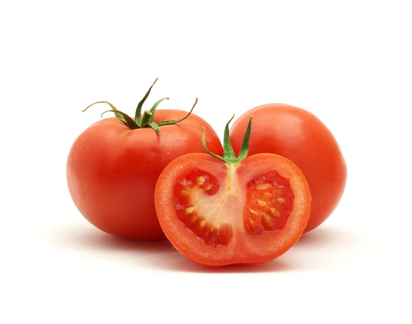 Три ізольованих помідори — стокове фото