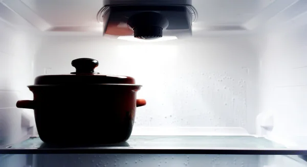 Saucepan into refrigerator — Stock Photo, Image