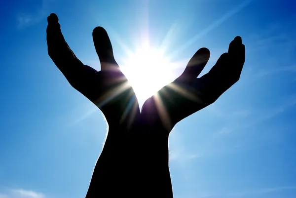 Sun in hands — Stock Photo, Image