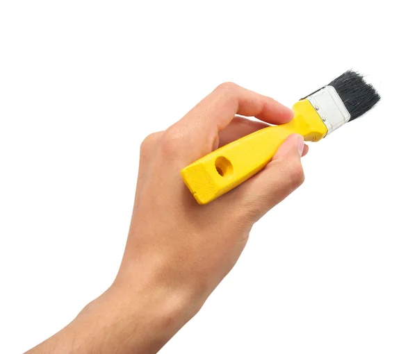 Hand med gula borste — Stockfoto