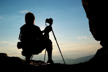 Silhouette of photographer clipart