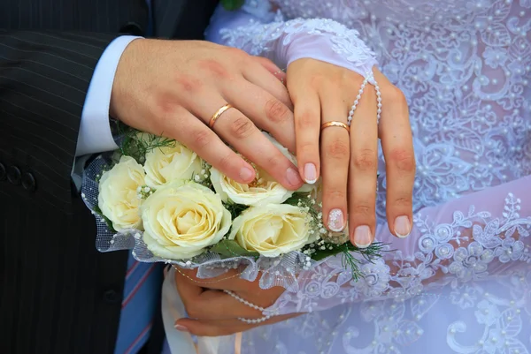 stock image Hands of newlywedses