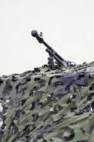A metralhadora pesada disfarçada em um milhão — Fotografia de Stock