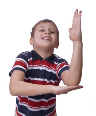 Schoolboy with his hand raised clipart