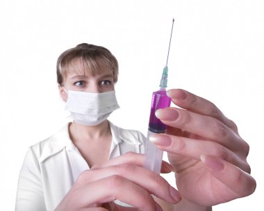 Female doctor with mask holding syringe clipart