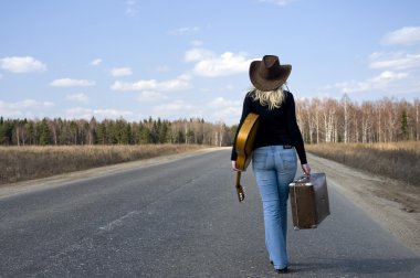 Country girl with guitar goes clipart