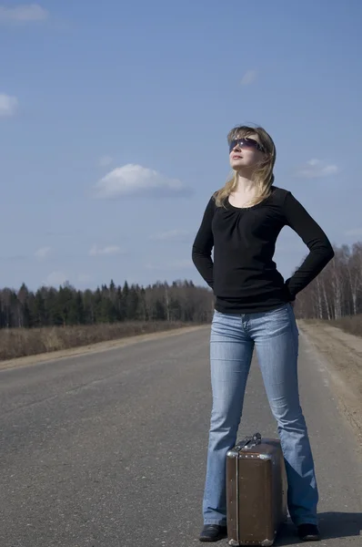 stock image Girl waiting on the road