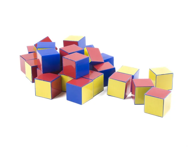Маленькая куча цветных пластиковых кирпичей игрушки — стоковое фото