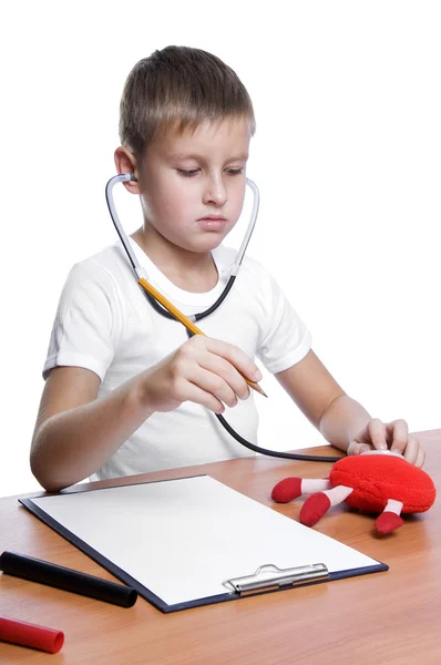 Carino giovane ragazzo giocare medico — Foto Stock