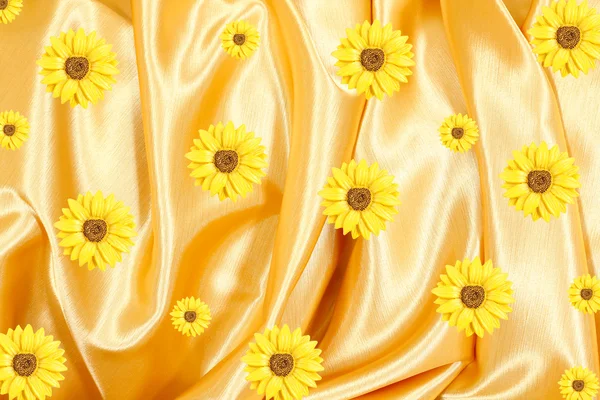 The golden fabric with yellow flowers — Stock Photo, Image