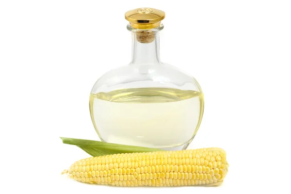 Kukuřičný olej ve skleněné láhve a kukuřičným klasem — Stock fotografie