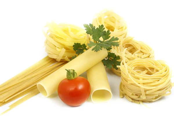 Pasta with greens and tomato — Stock Photo, Image
