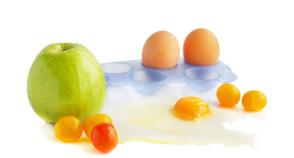 Braune Eier und grüner Apfel — Stockfoto