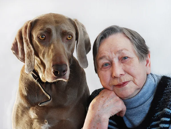 Senior woman with dog — Stock Photo, Image