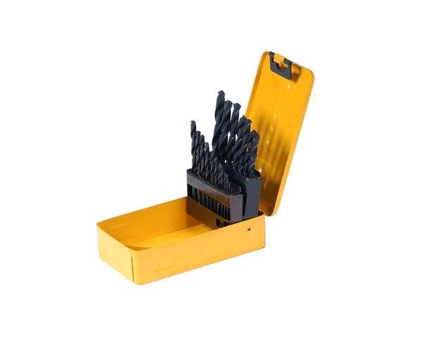 Brocas em uma caixa de metal amarelo — Fotografia de Stock