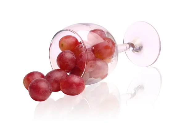 Red grapes and glass — Stock Photo, Image
