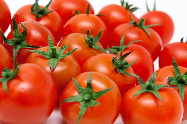 Sett med tomater isolert på hvitt – stockfoto