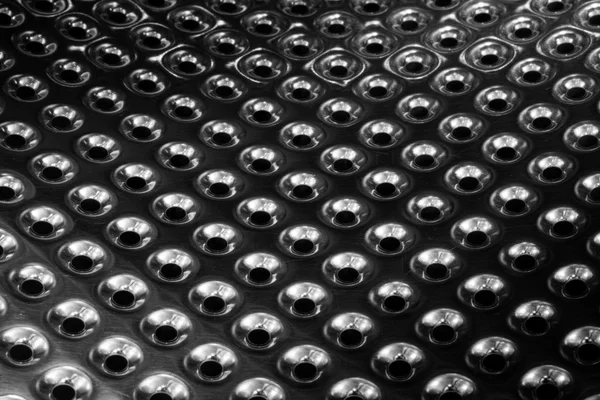 stock image Concave metal surface background with holes