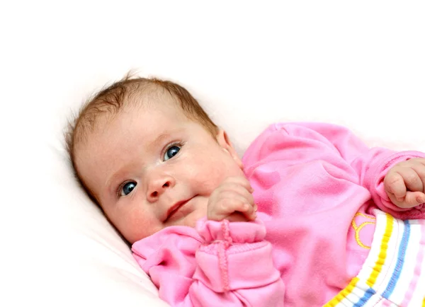 Novorozená holčička na polštář — Stock fotografie