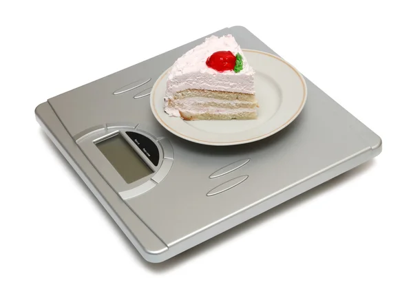 Торт на весах — стоковое фото