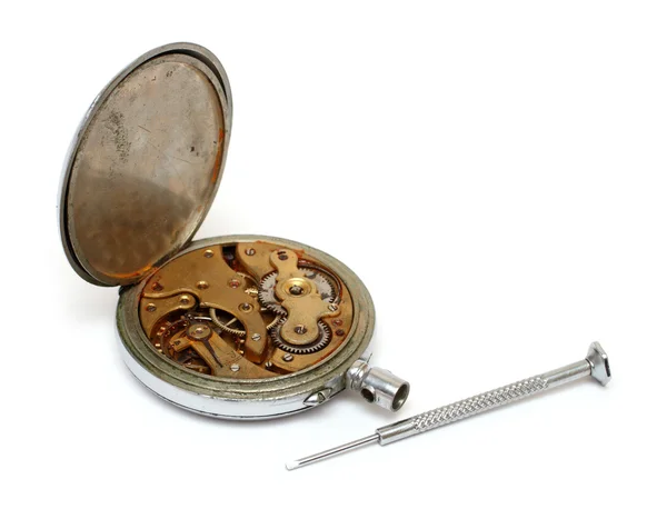 Relógio velho e chave de fenda — Fotografia de Stock