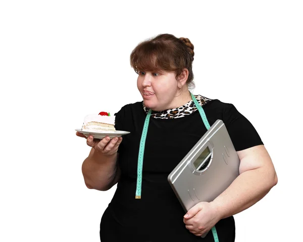 Dieting overweight women with cake — Stock Photo, Image