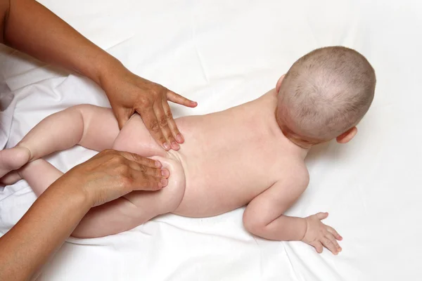 Small baby massaging — Stock Photo, Image