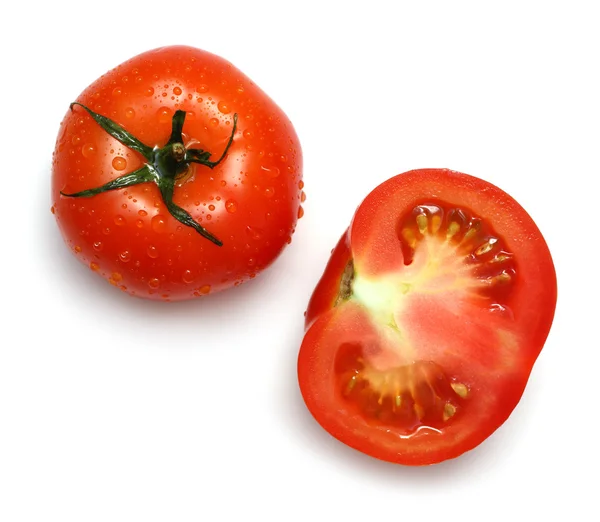 Sekce a celá rajčata — Stock fotografie