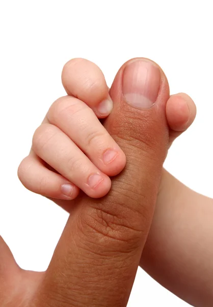 Dítě drží otec prst — Stock fotografie