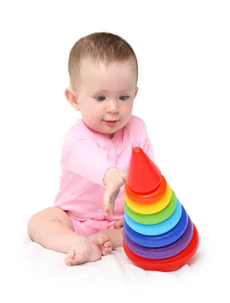 Bébé fille jouer avec pyramide — Photo