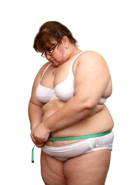 Overweight woman measure her stomach clipart