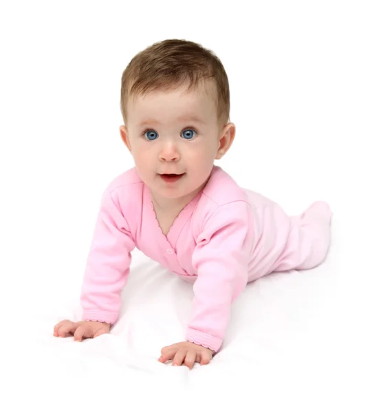 Baby in pink on white sheet — Stock Photo, Image